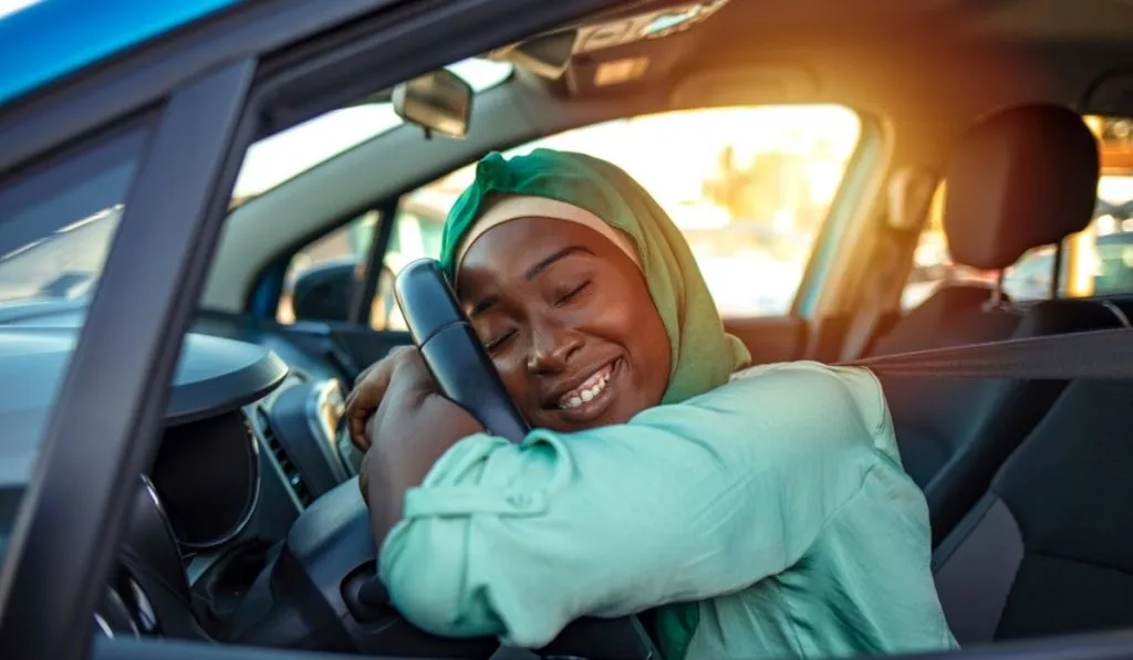 How can I save money to buy a car in Kenya?